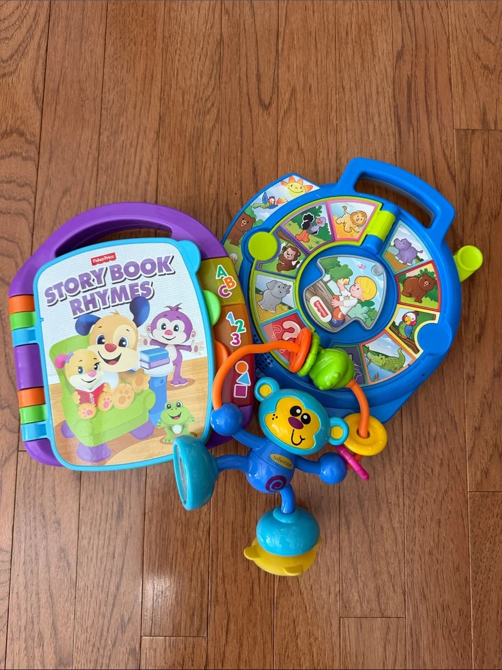 Fisher-Price Blue & Purple Story Book Rhymes and Spin Toy Set